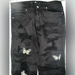 Men’s embroidered butterfly distressed jeans